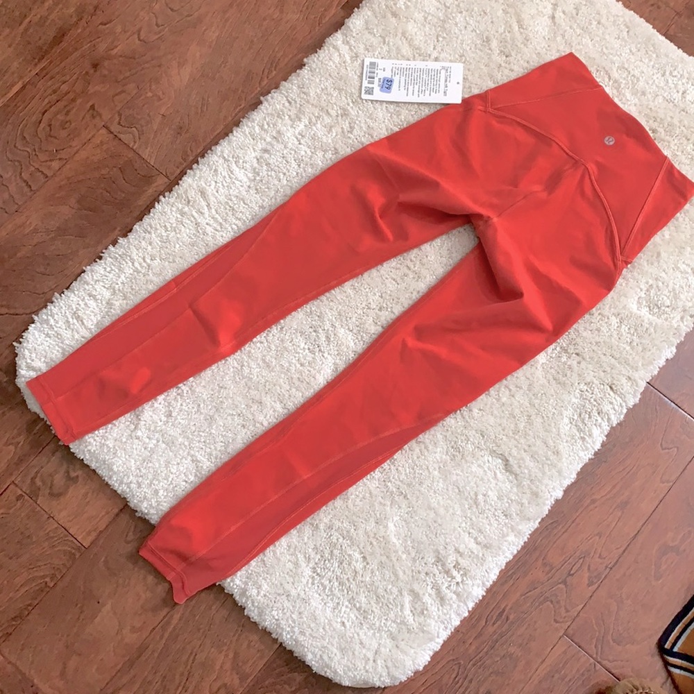 Lululemon Train Times HR Tight 25” size 2 coral